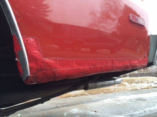 Attached picture drivers side rear quarter close up.jpg